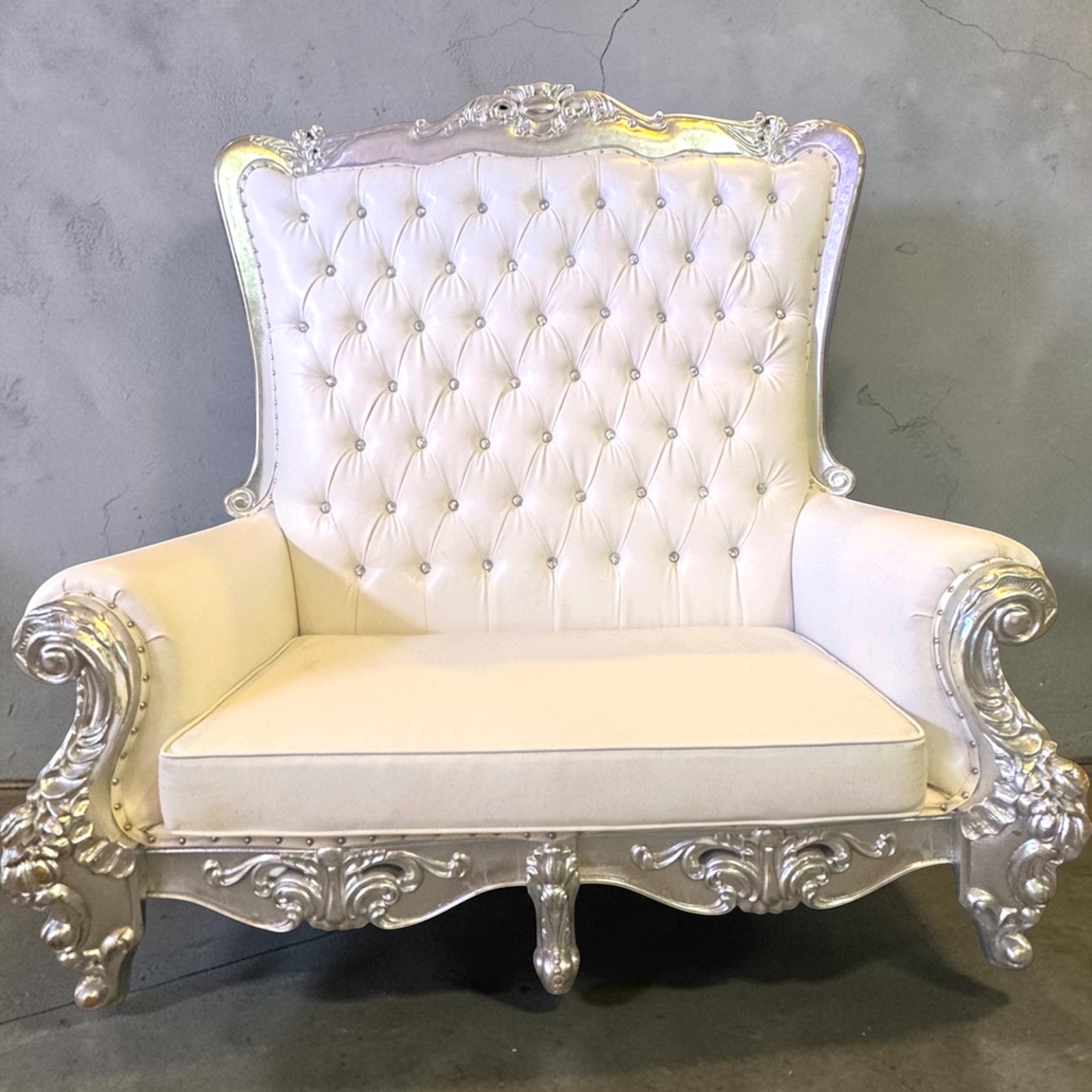 Silver and white throne couch